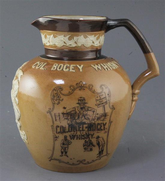 A Royal Doulton stoneware Col. Bogey Whisky jug, height 20cm